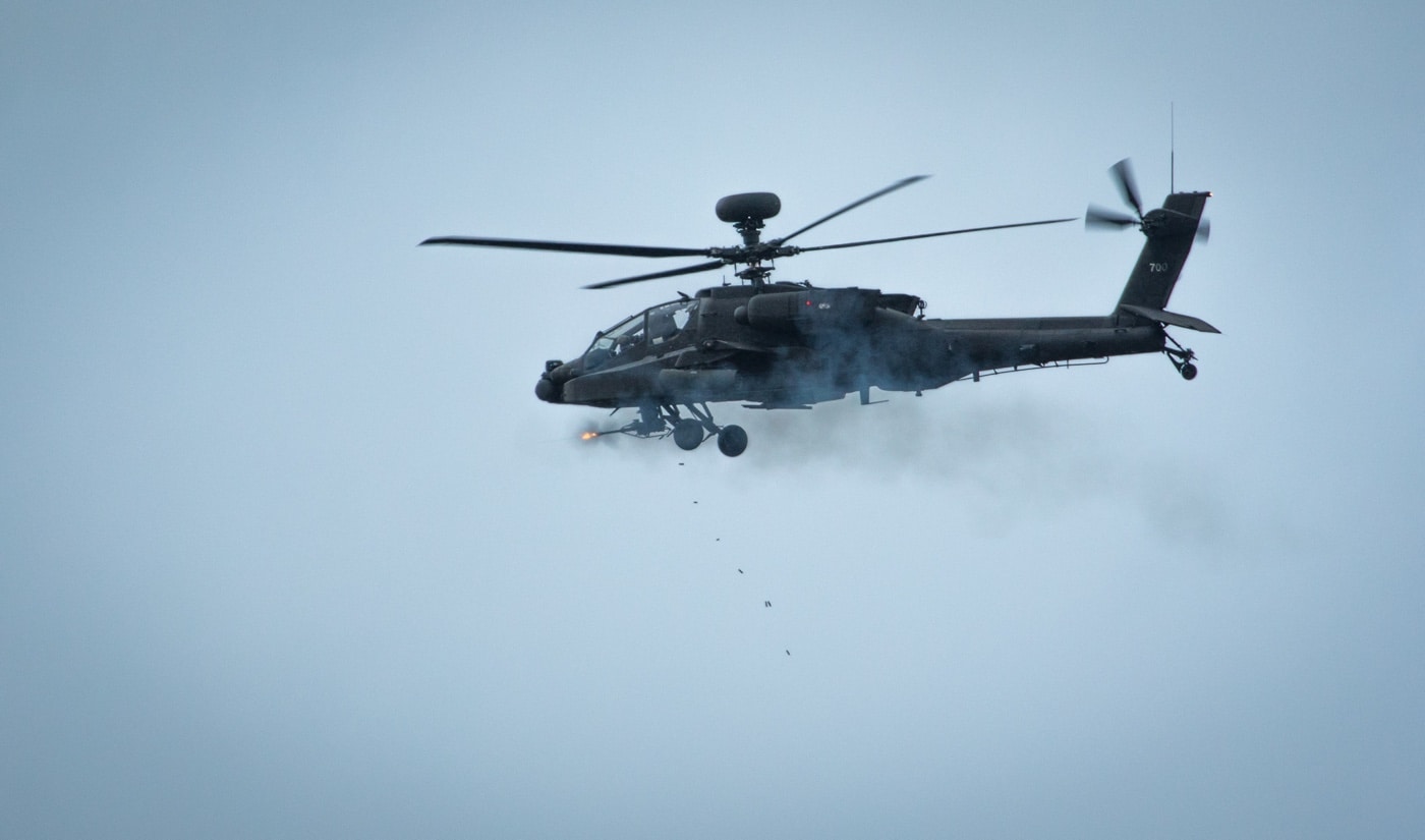 ah-64 apachee firing m230 chain gun