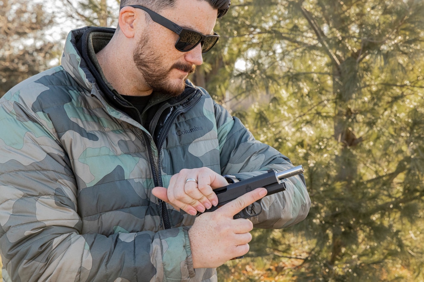 author loading the 1911 air pistol