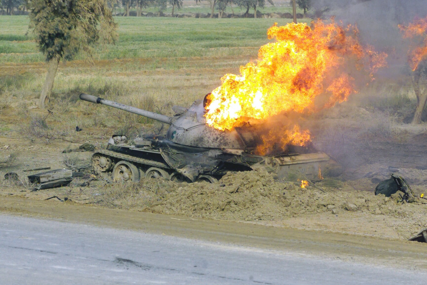 burning t-55 tank