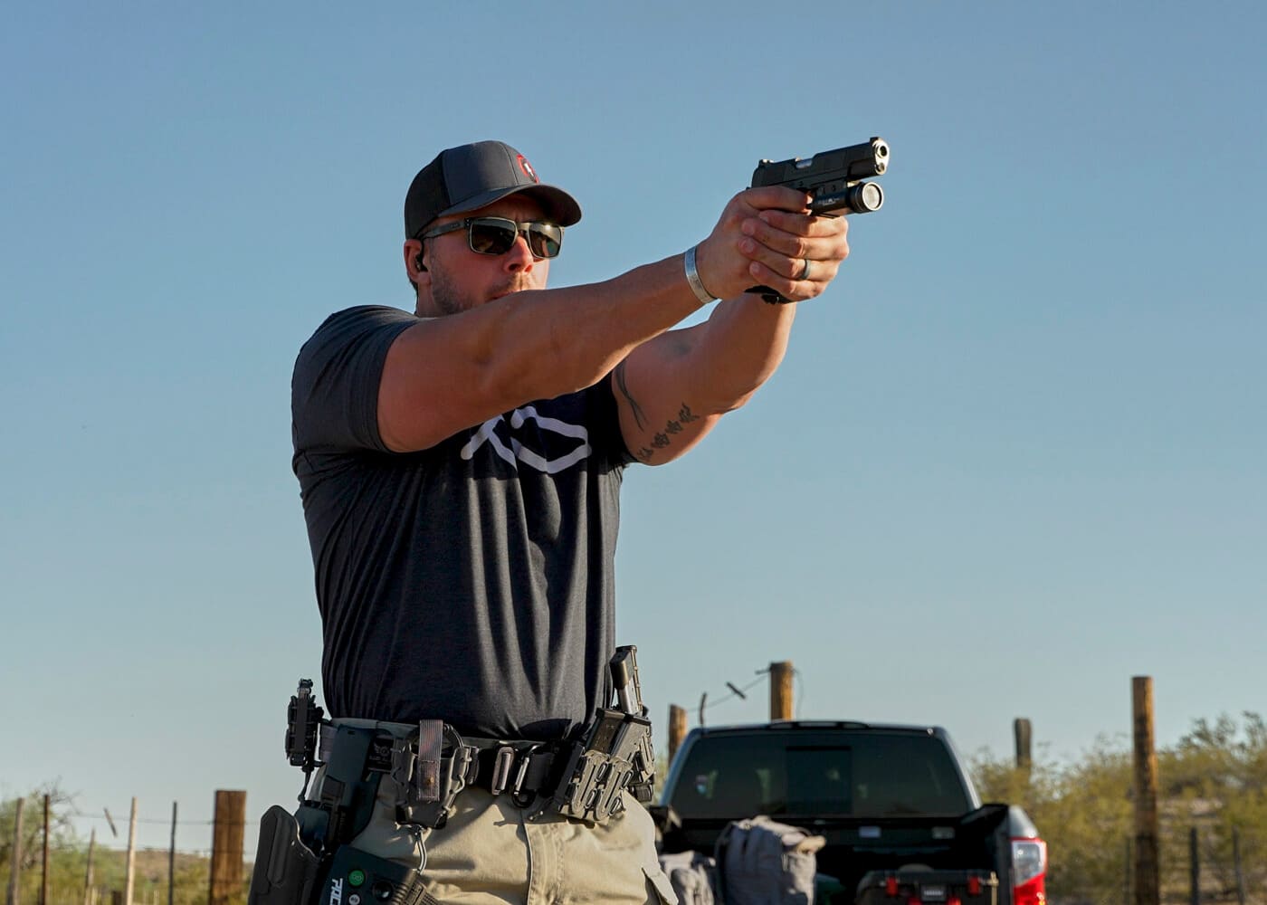 cop shooting a 1911 pistol