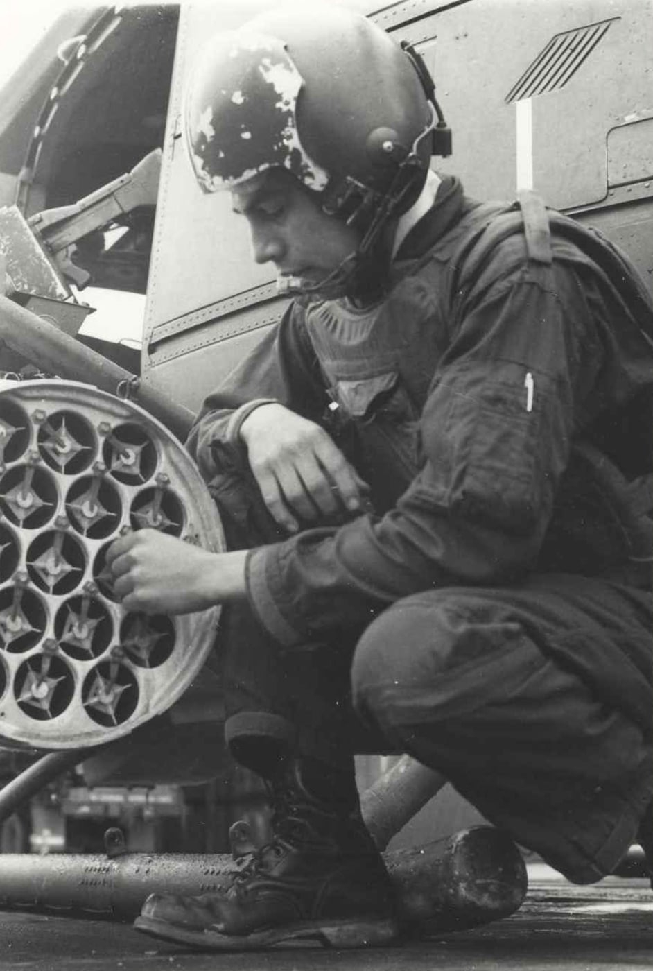 loading a rocket pod on a uh-1e