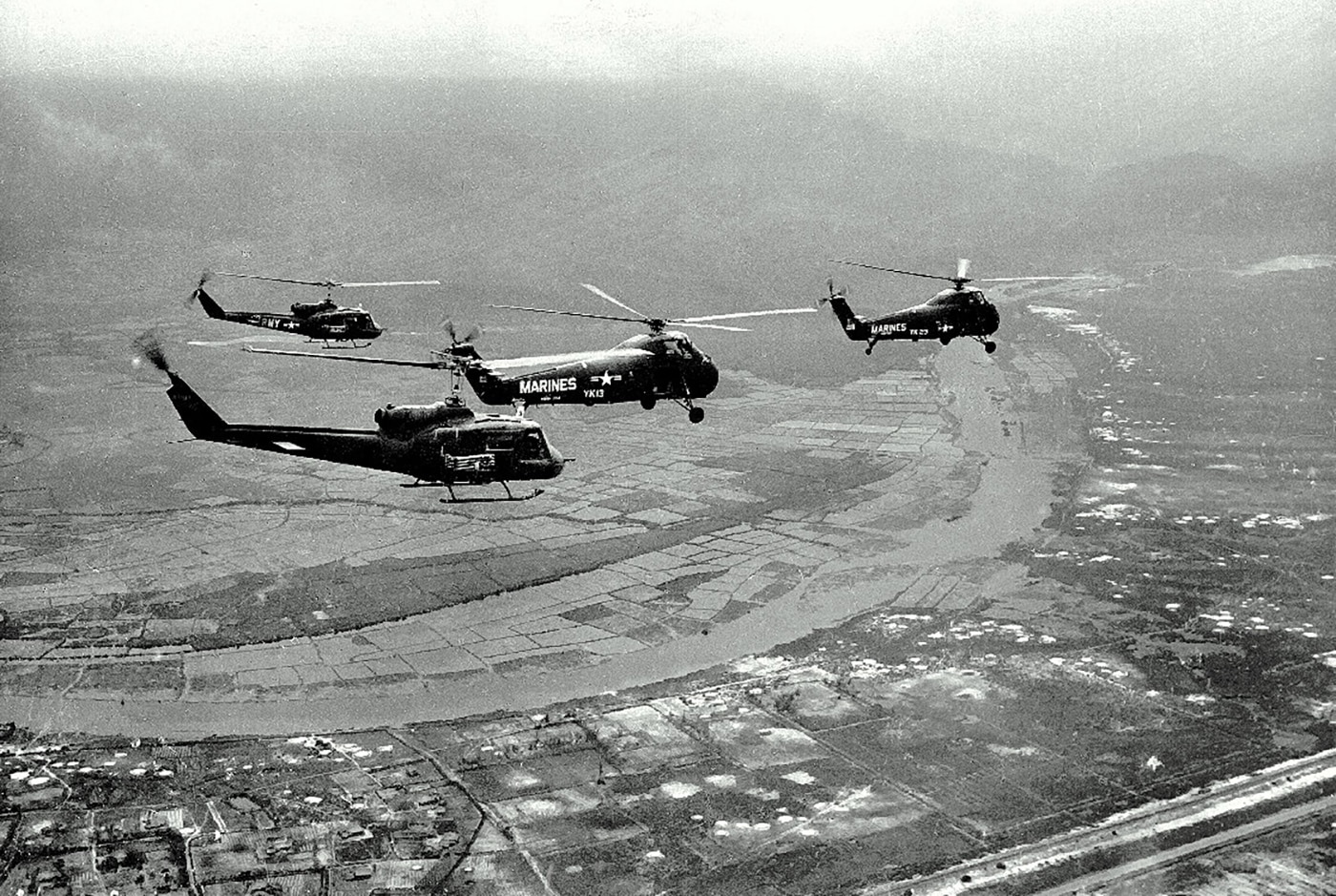 us army uh-1 huey hog escorting marine helicopters