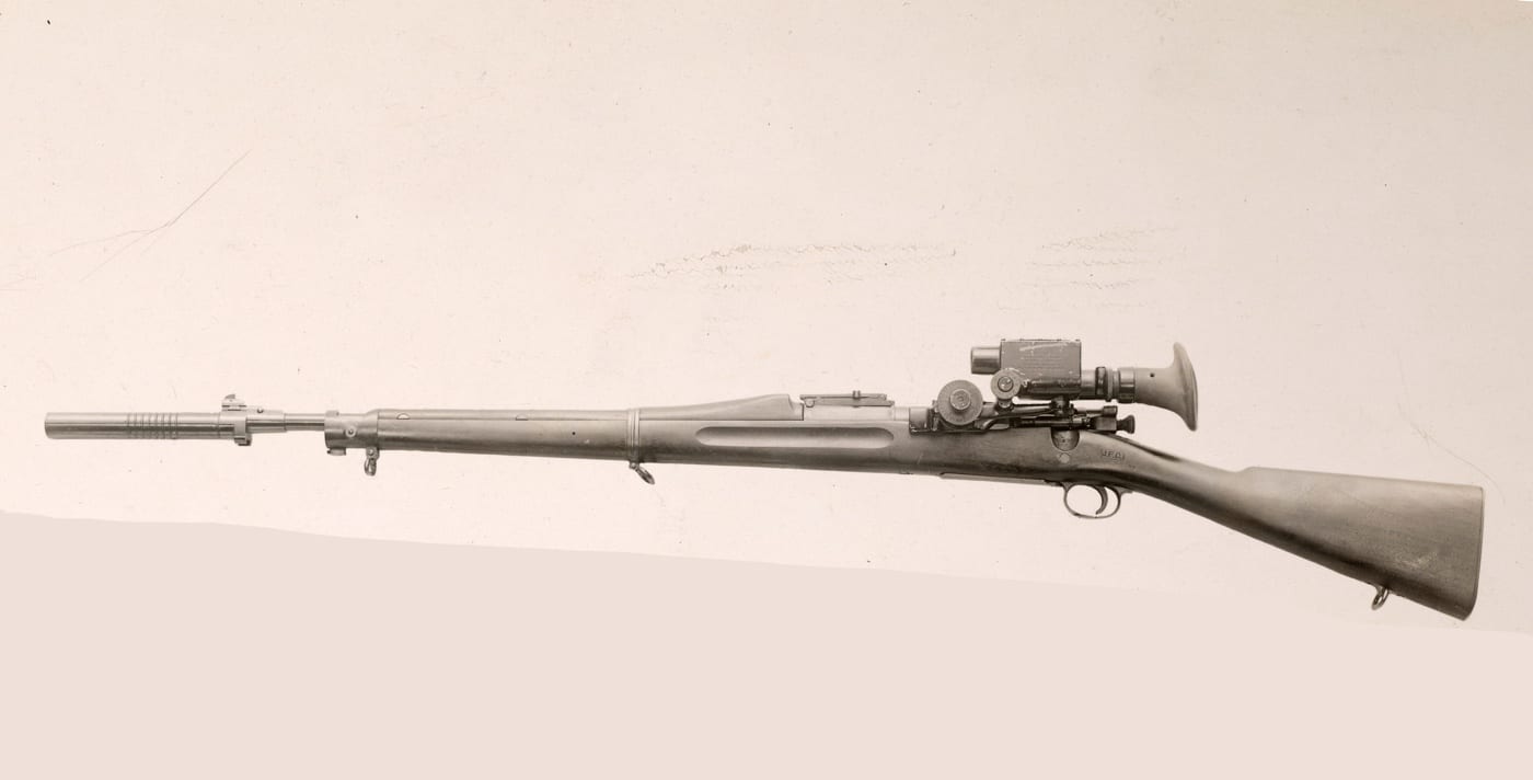 1903 rifle equipped with maxim silencer and telescopic sight