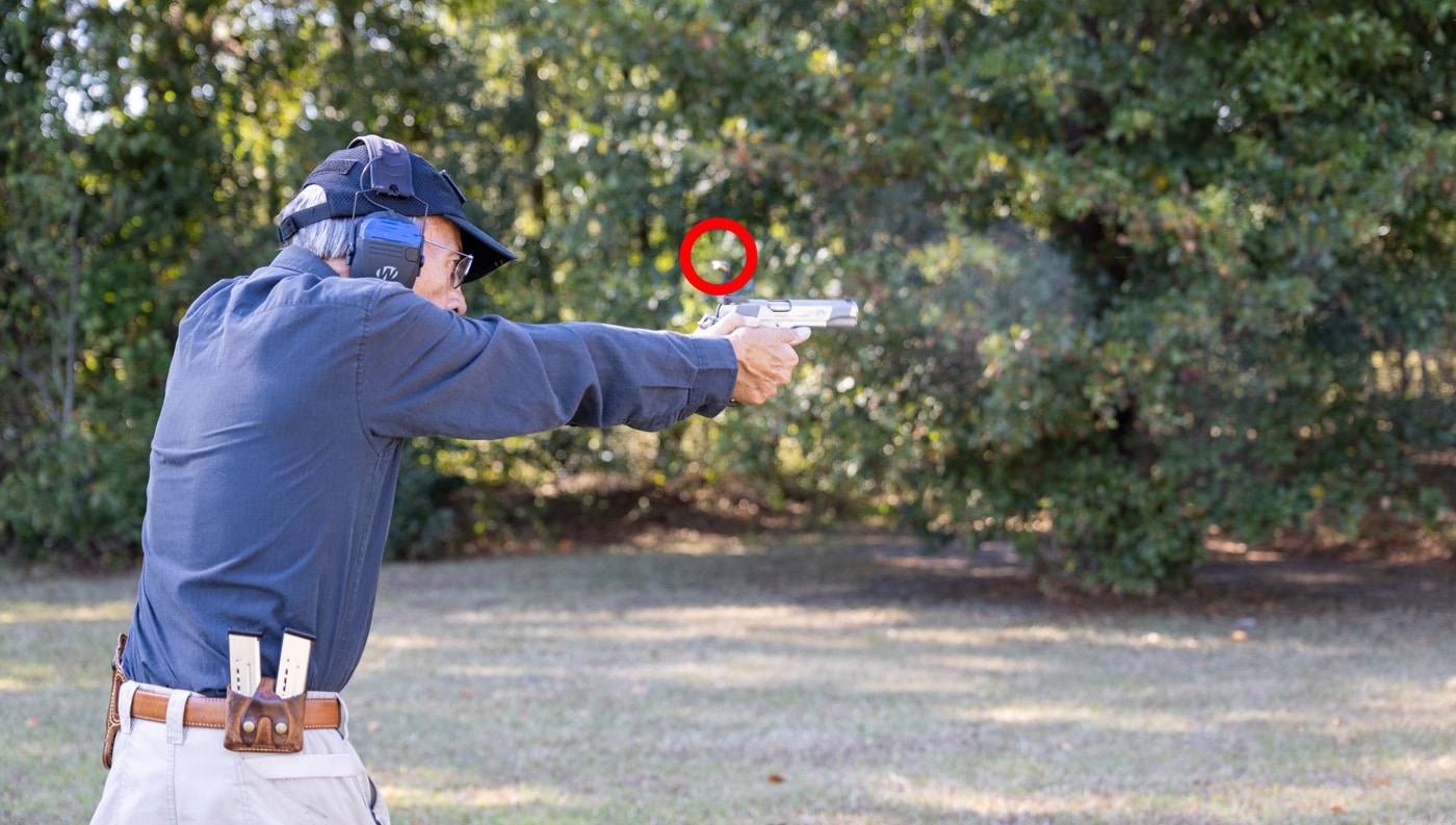 ayoob shooting a match with his left hand