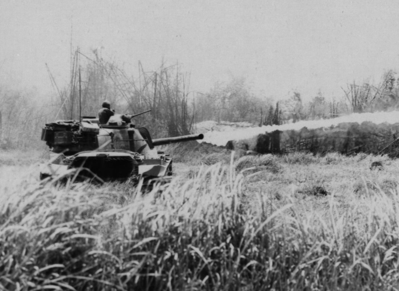 usmc m67 zippo flame tank attacks a vc position in the vietnam war