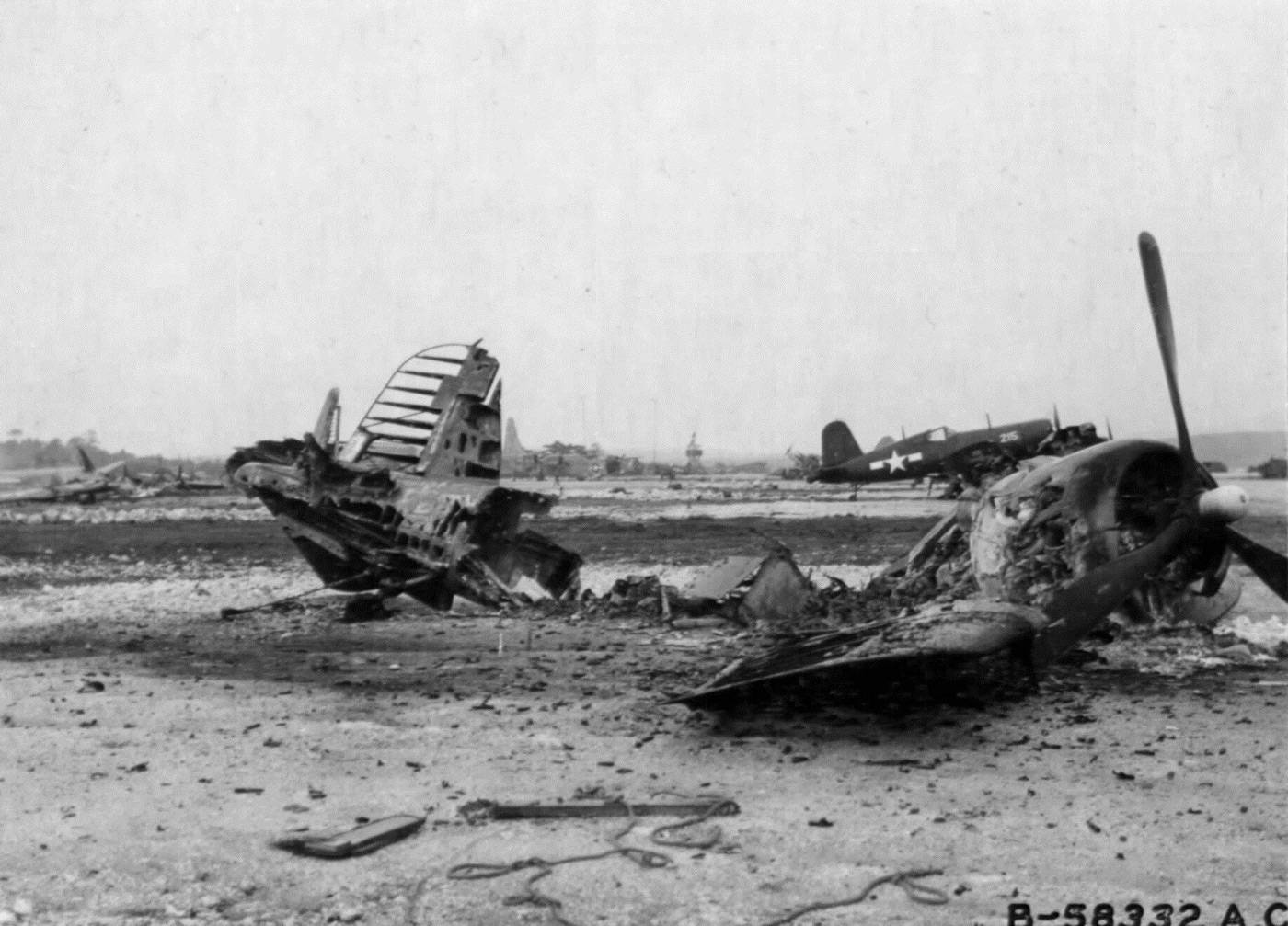 wrecked usmc corsair fighter on yontan field