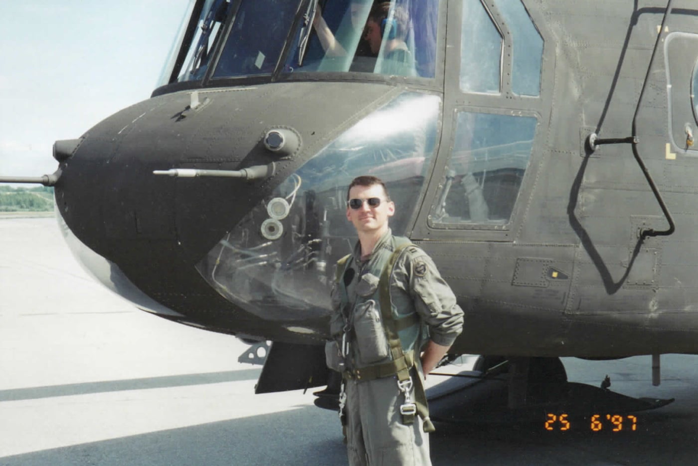 author standing next to his chinook