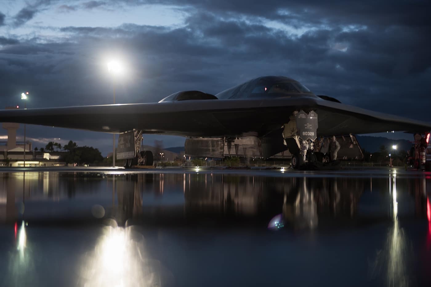 b-2 bomber prepping for a night training mission at pearl harbor