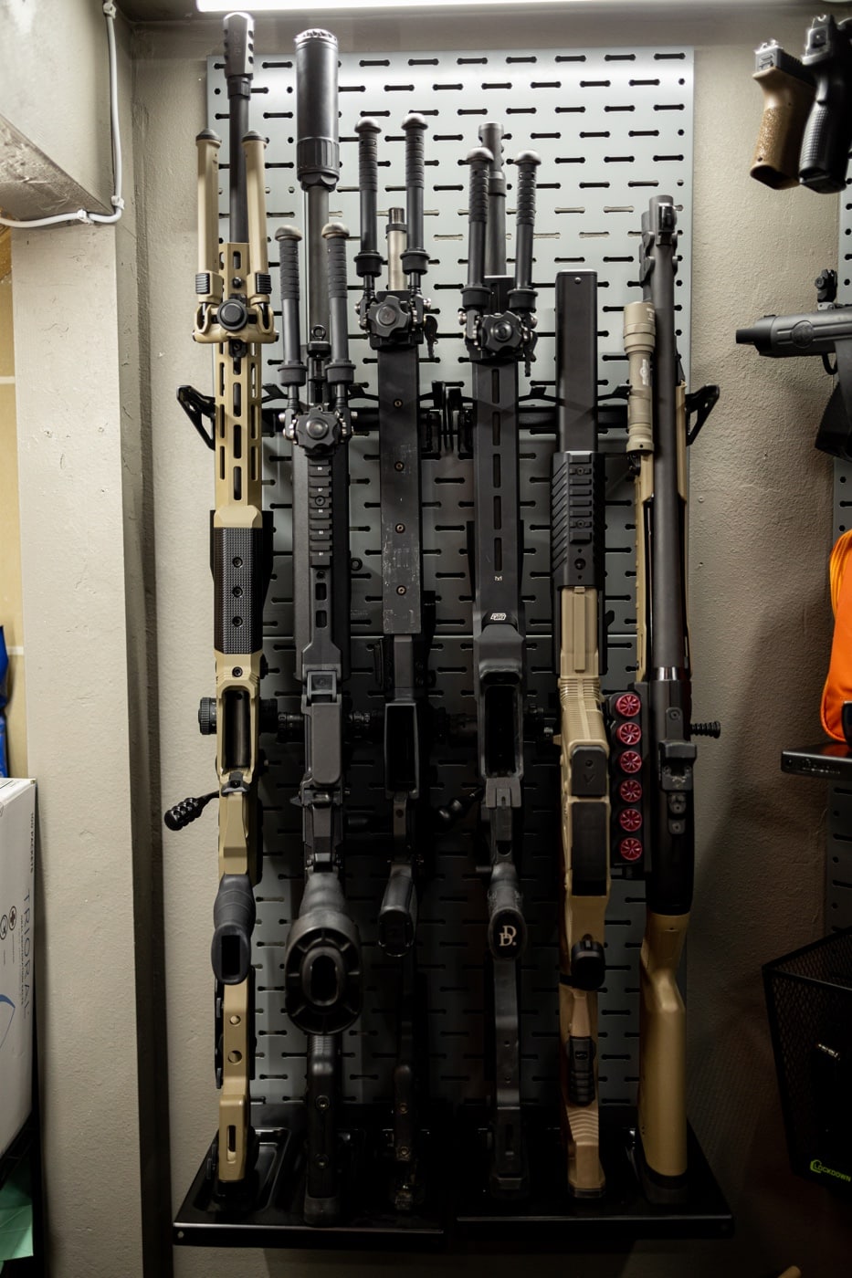 storing rifles upright on secure wall