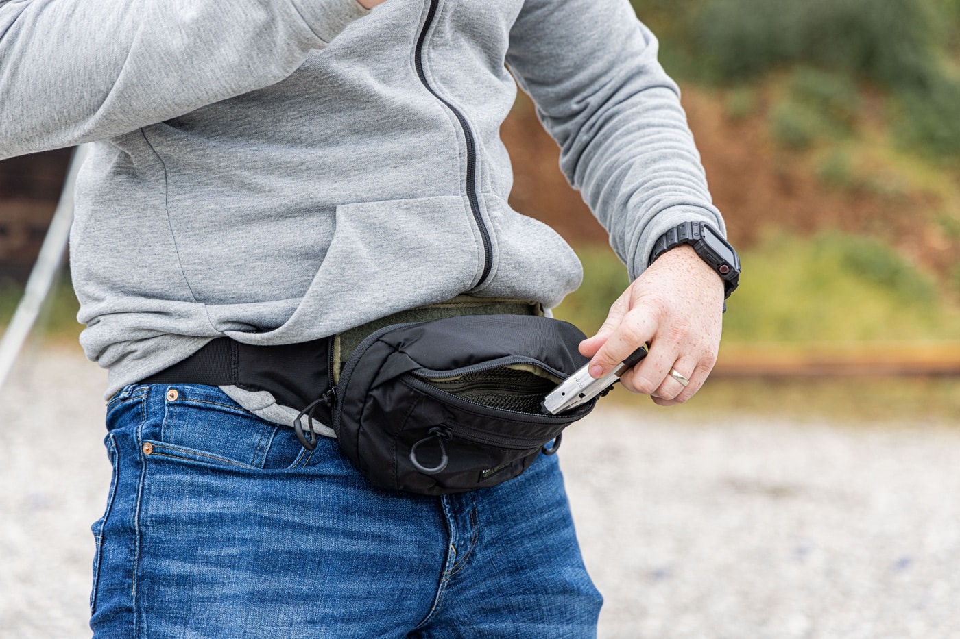 carrying a spare magazine in a waist pack