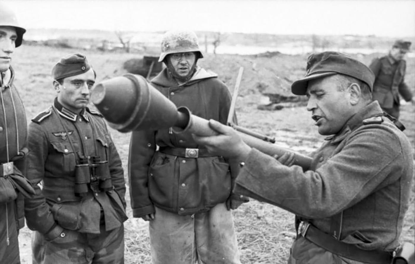 german sergeant teaches soldiers how to use the panzerfaust