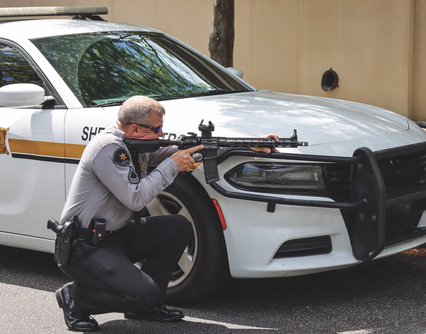 police officer with aimpoint duty rds sight