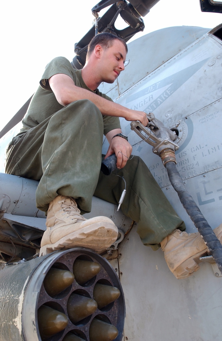 refueling a super cobra helo