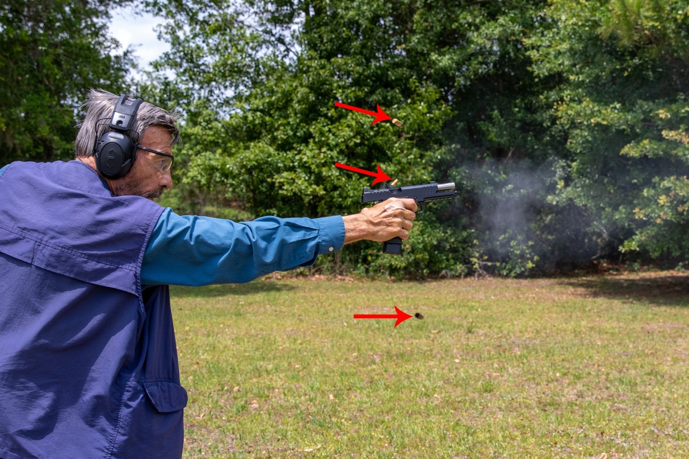 author demonstrating shooting the prodigy one handed