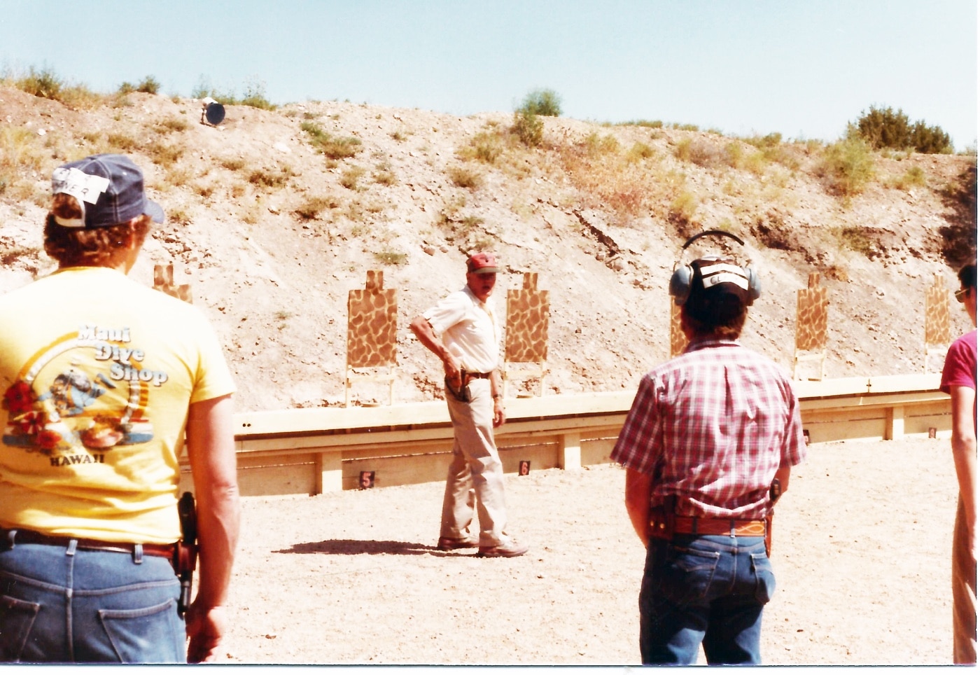 cooper teaching a class on the range