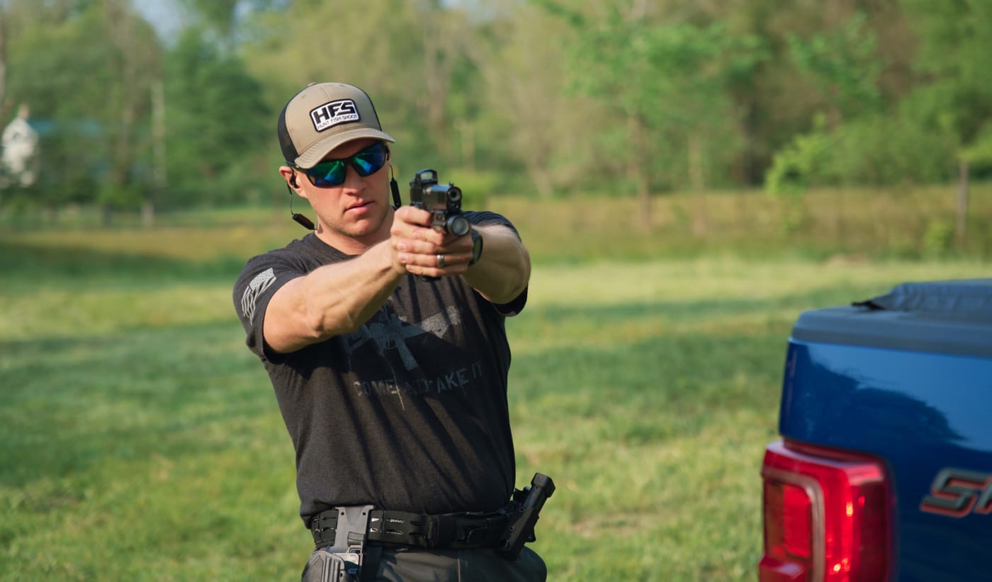 pistol shooting position around truck