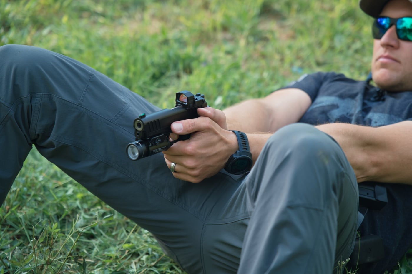 shooting a pistol from laying down