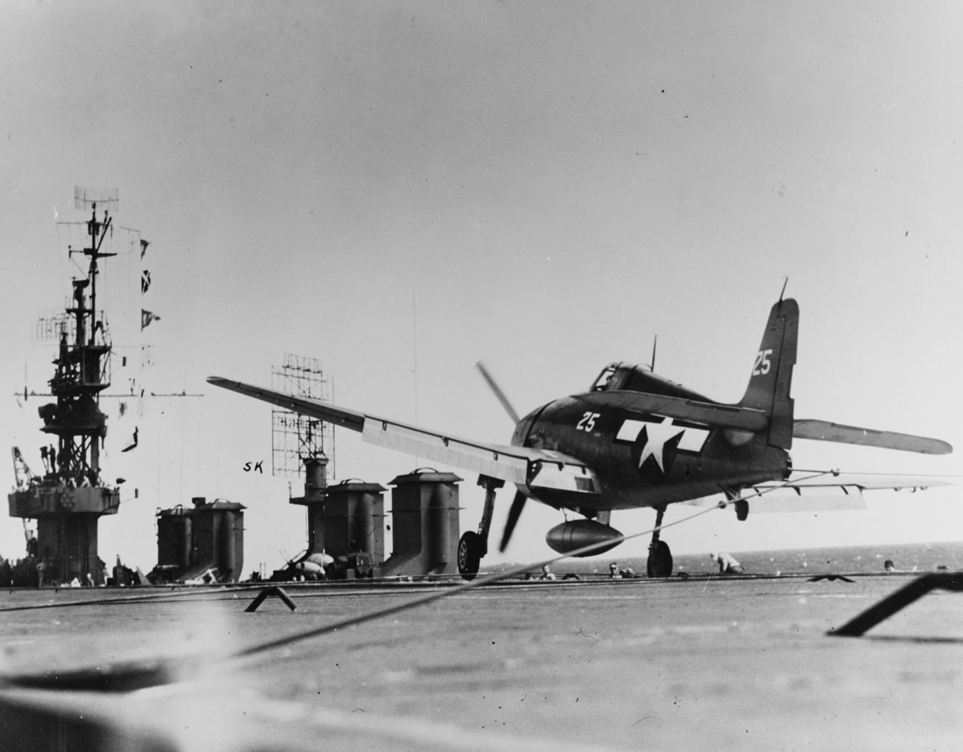 a f6f hellcat lands on the uss cowpens cvl-25