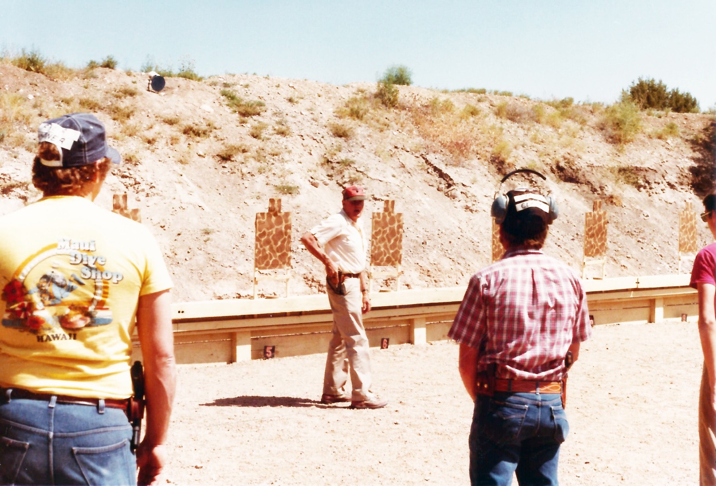 cooper teaching a class on the range