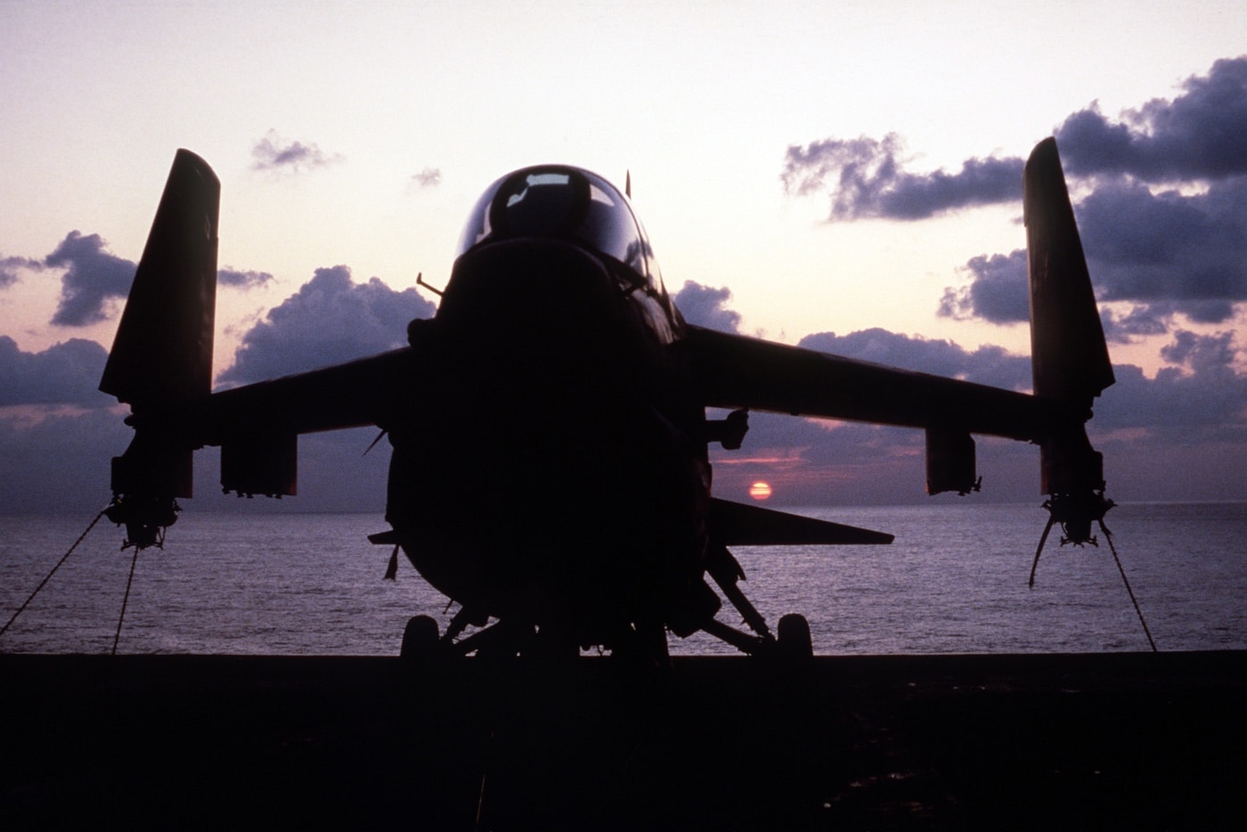 a-7 corsair silhoutte sunset uss carl vinson