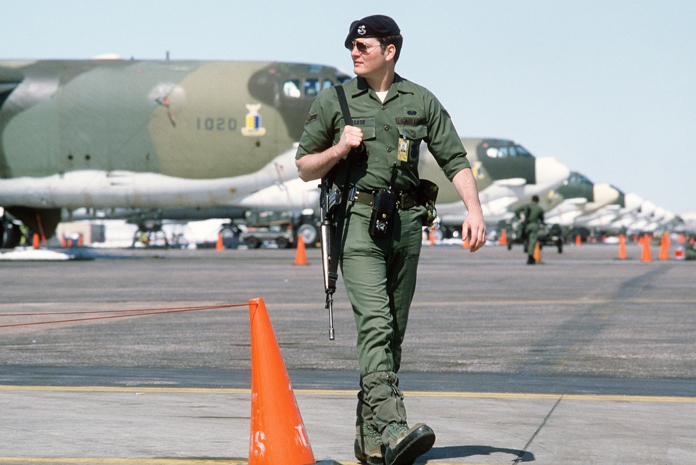 airman with m16 guards line of alert b-52 bombers