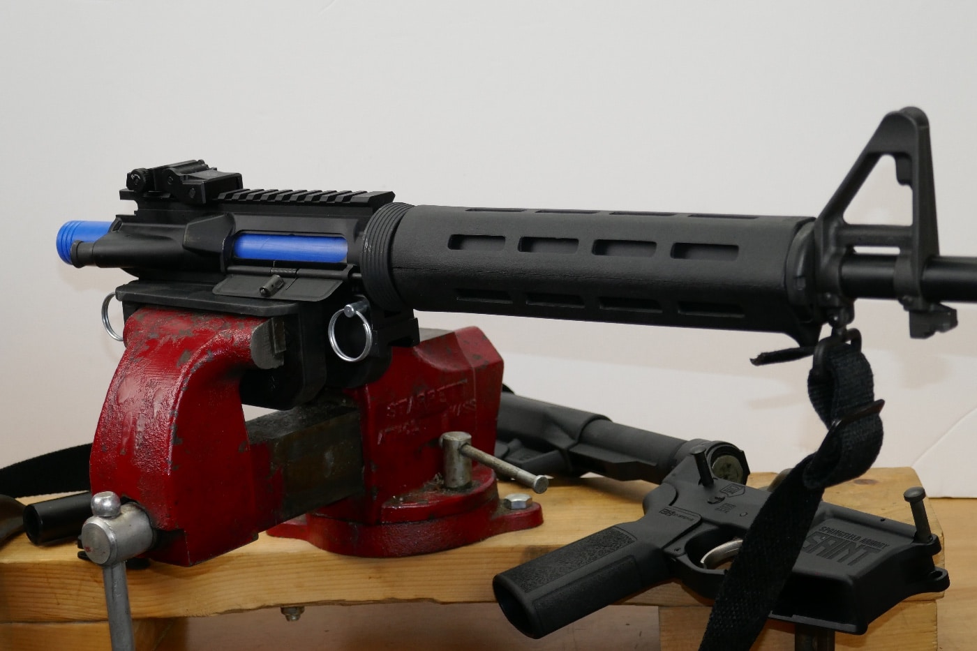 ar upper held in vise with precision reflex upper assembly block
