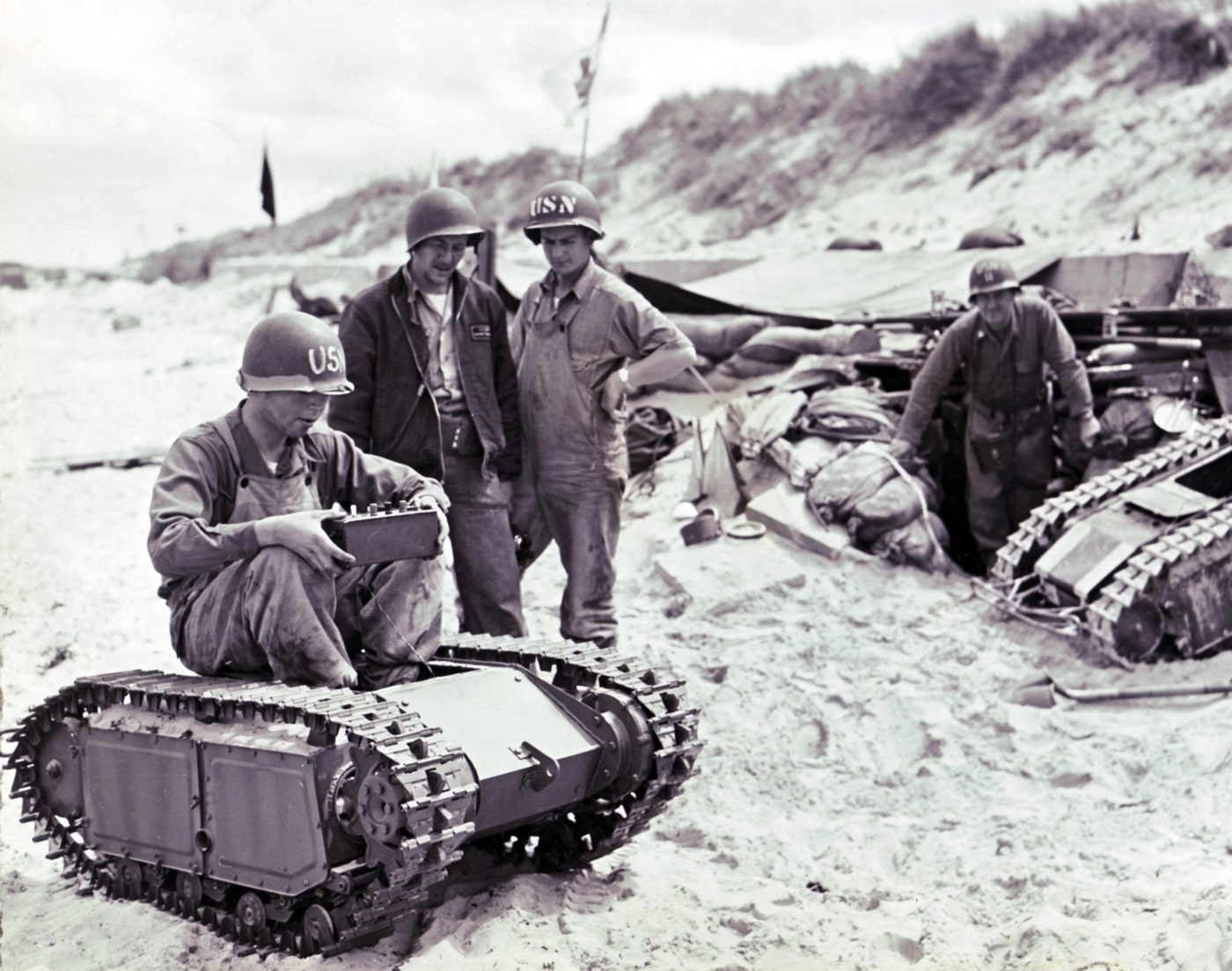 us troops with a goliath tracked mine at anzio