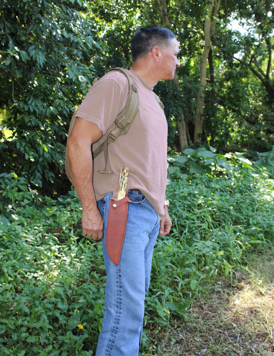 author with bear and son bowie knife