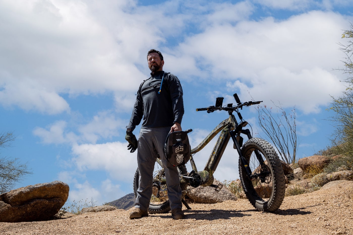 author with electric bike testing for hunting