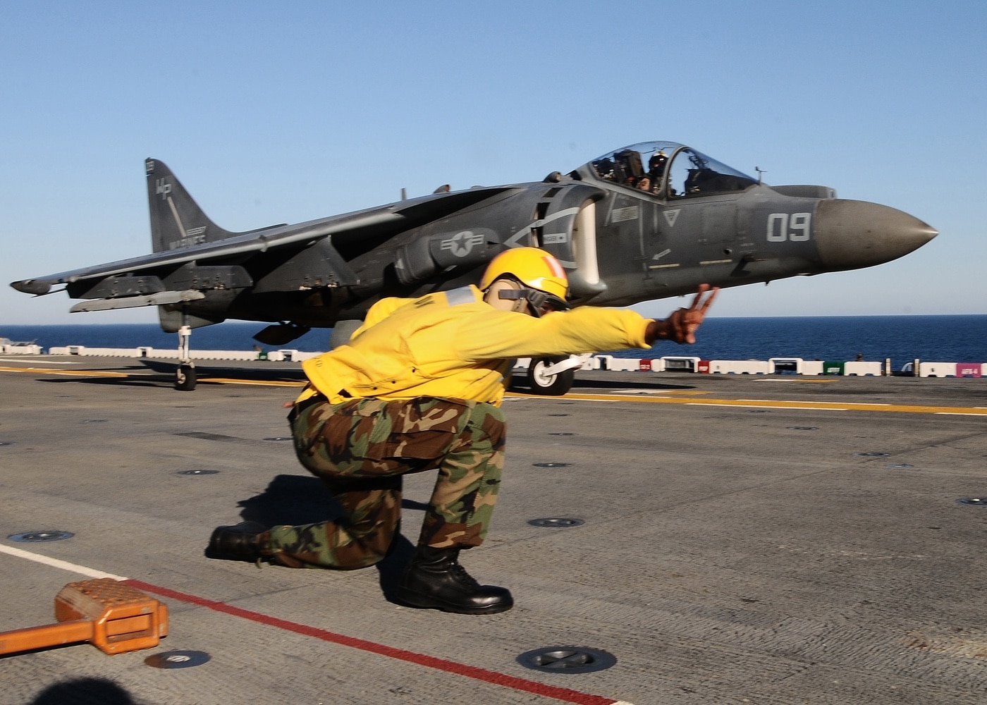 av-8b harrier launches from uss bataan lhd 5 amphibious assault ship