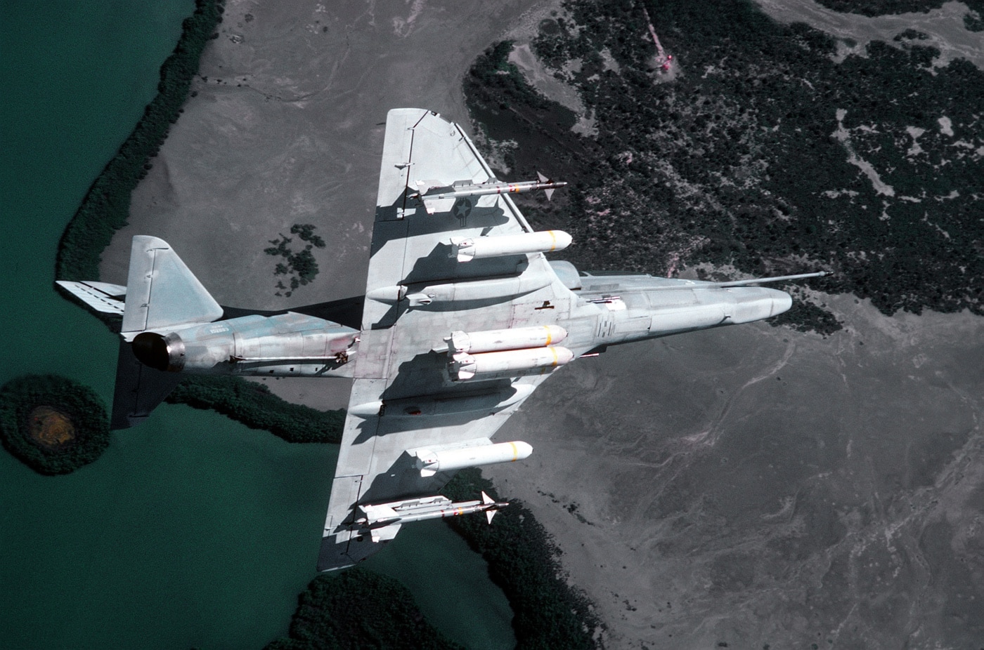 fully armed a-4 skyhawk flying over guantanamo bay cuba