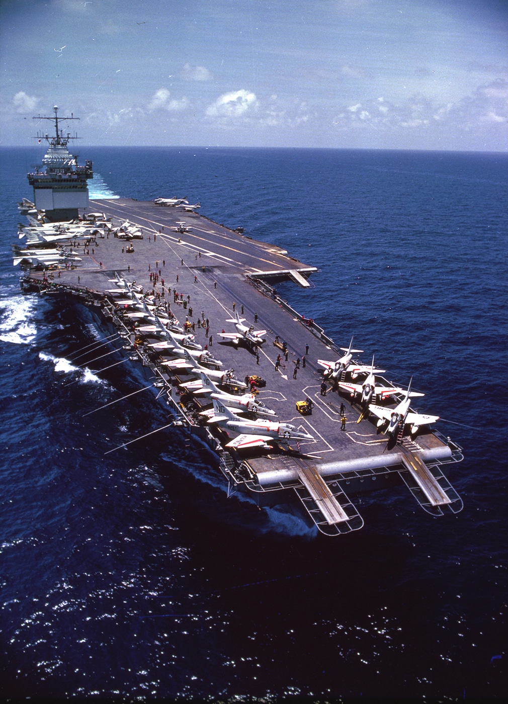 nuclear powered aircraft carrier uss enterprise in gulf of tonkin with a-4 skyhawk planes on deck