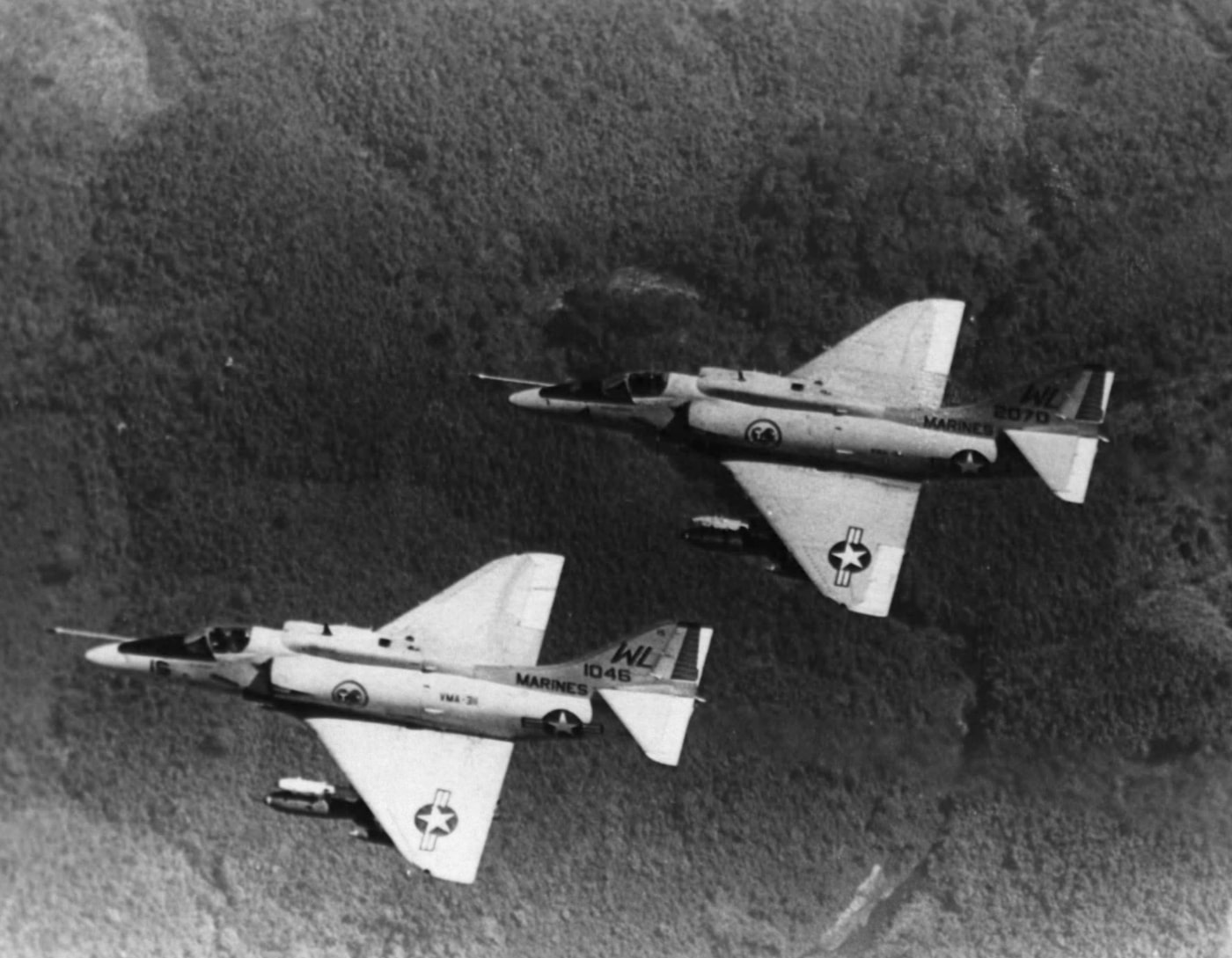 two a-4b skyhawk planes fly over south vietnam