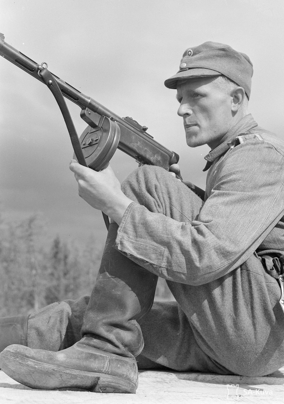finnish sniper on train roof with submachine gun