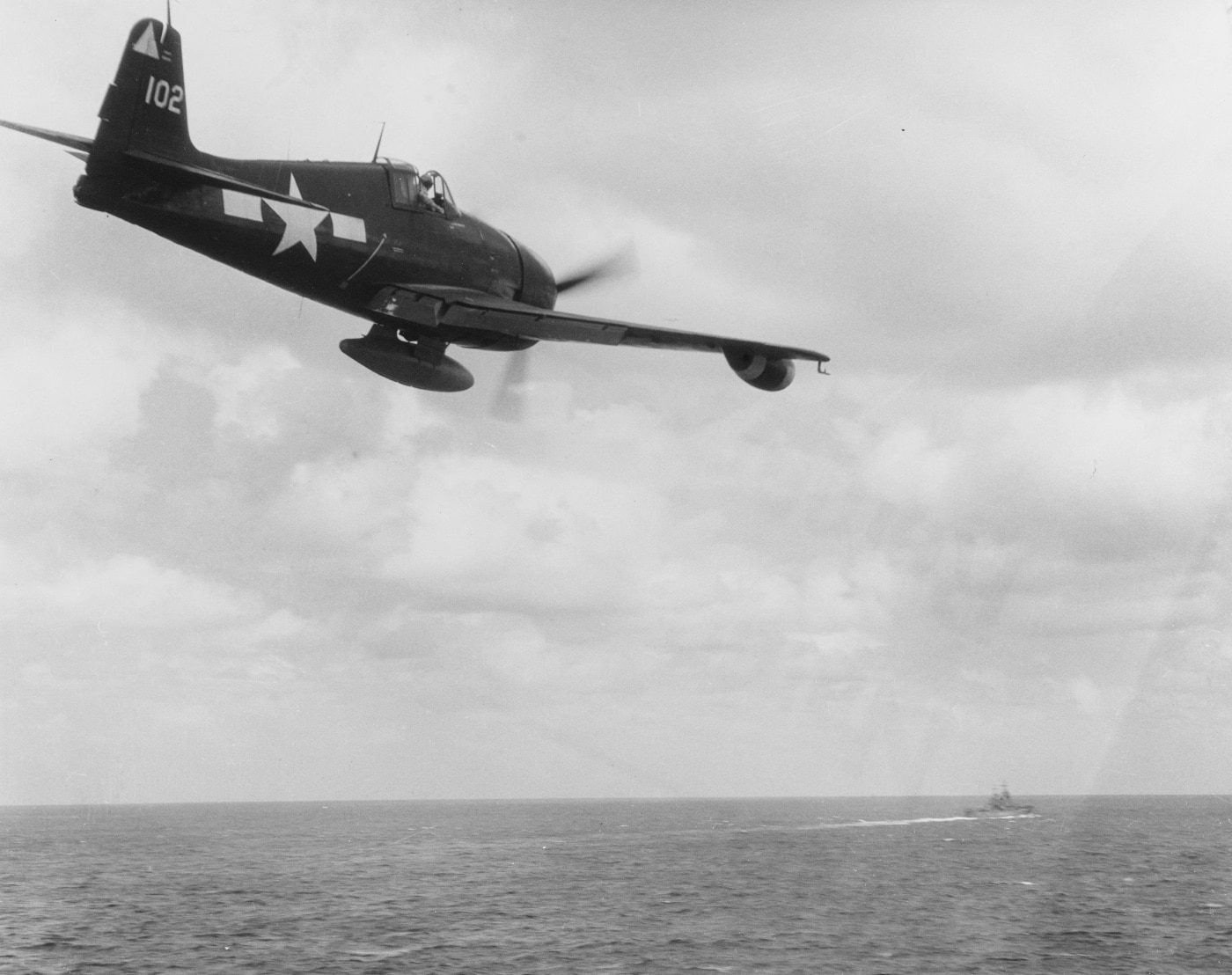 grumman f6f-5n hellcat night fighter flying past uss hornet 1944 world war ii