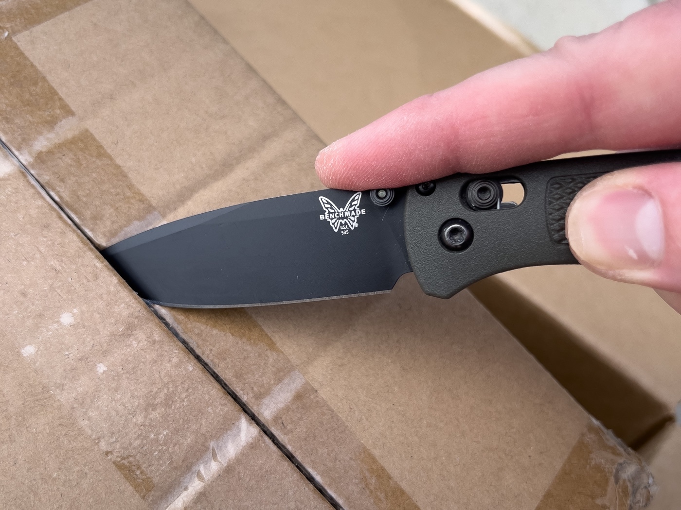 opening a box with the benchmade bugout knife