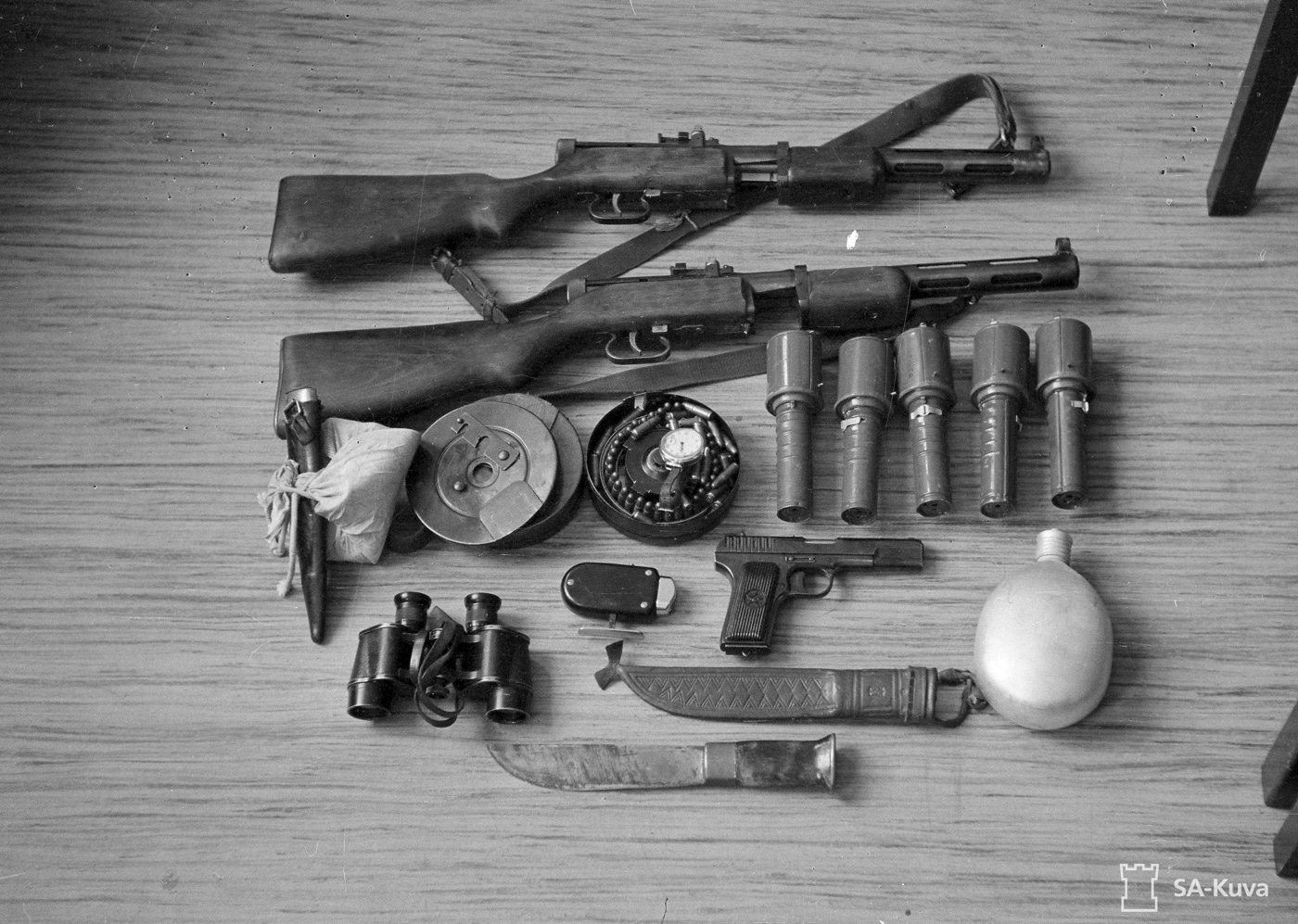 soviet union equipment captured including ppd-40 smg drum magazines and tokarev pistol