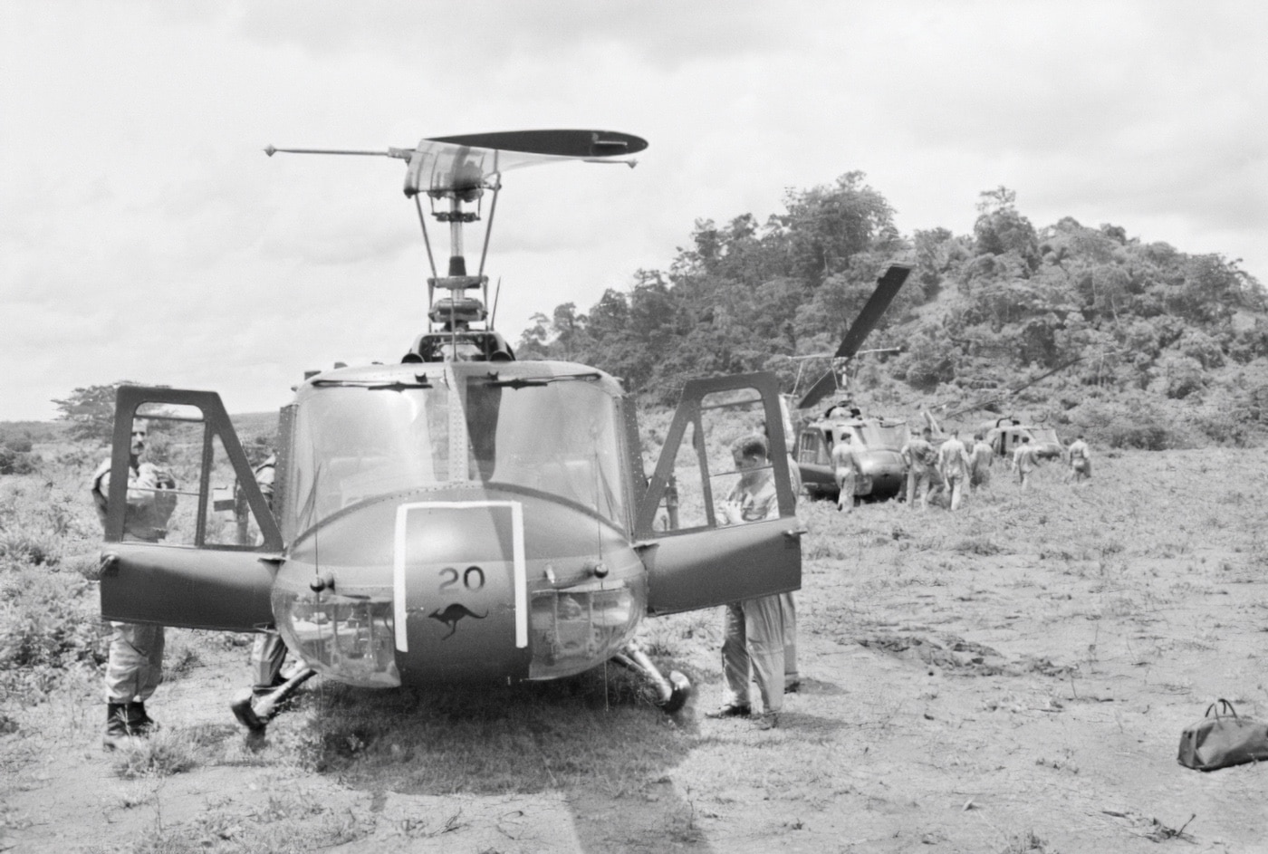 UH-1 Iroquois "Huey" helicopters of No 9 Squadron, RAAF, at the Task Force Headquarters preparing for a troop support mission in August 1966.