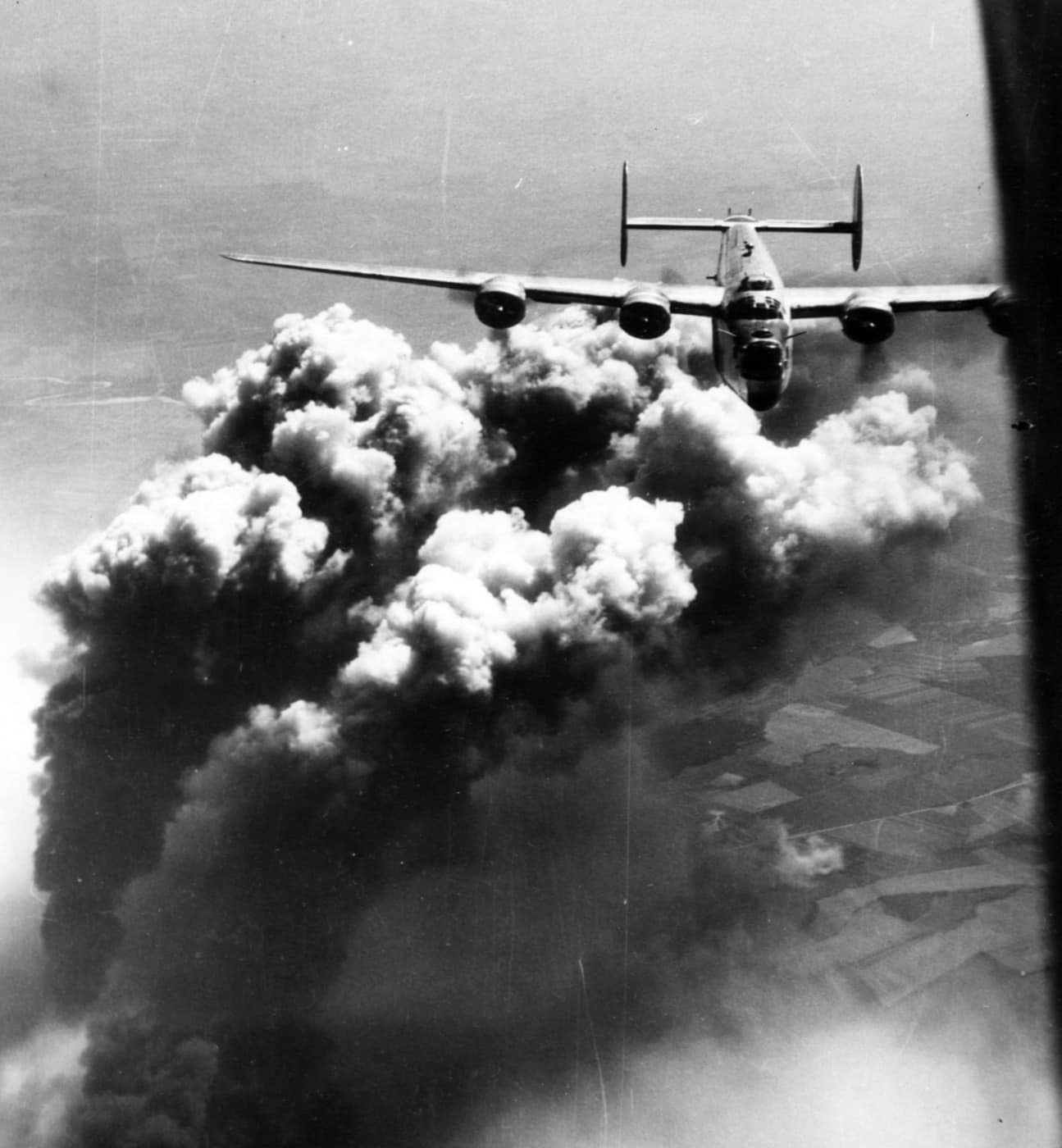 This photo shows columns of smoke rising up from burning petroleum at a refinery that was hit by a B-24 raid. This was the kind of bombing raid that led directly to Operation Gunn.