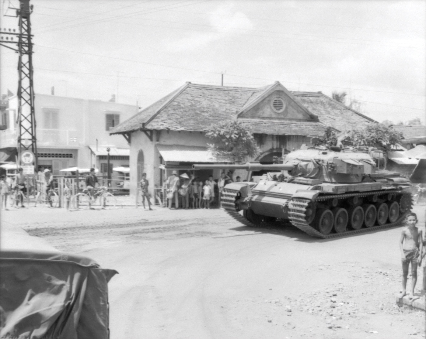 Here a Centurion MK 5/1 tank is shown on the move. The Australian tank was part of the 1st Australian Armoured Regiment (1AR). The tank was en route from Nui Dat to Fire Support Base Coral in Bien Hoa Province during the Second Indochina War. While some considered it an American war, many countries were involved directly and indirectly.