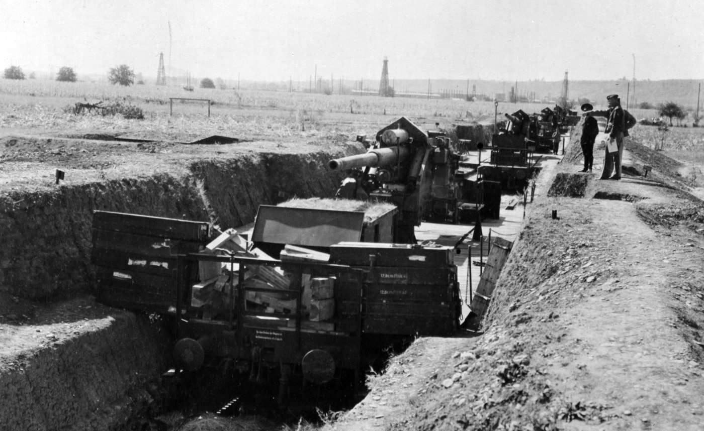 In this photo we can see how Germans in World War II used rail cars to mount and move large anti-aircraft guns around. This gave the German military the flexibility to move defensive emplacements to catch Allied bombers off guard and ambush attacking B-17s, B-24s and B-25s. 