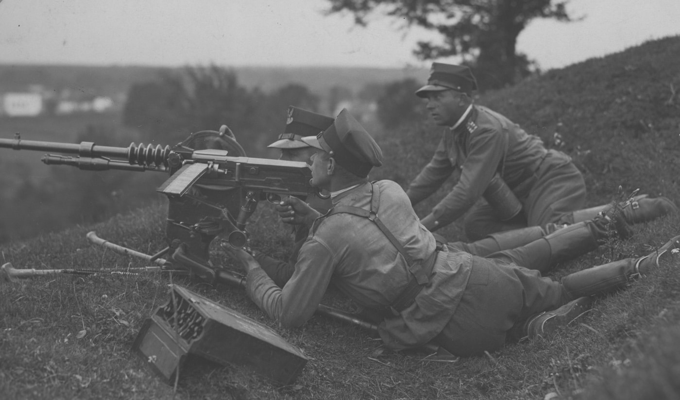 This photo shows two Polish soldiers practice setting up a Model of 1914 gas-actuated Hotchkiss machine gun chambered in 7.92 Mauser in 1931. In a few short years, these soldiers would employ the gun to defend against the invasion by Nazi Germany and the Soviet Union.