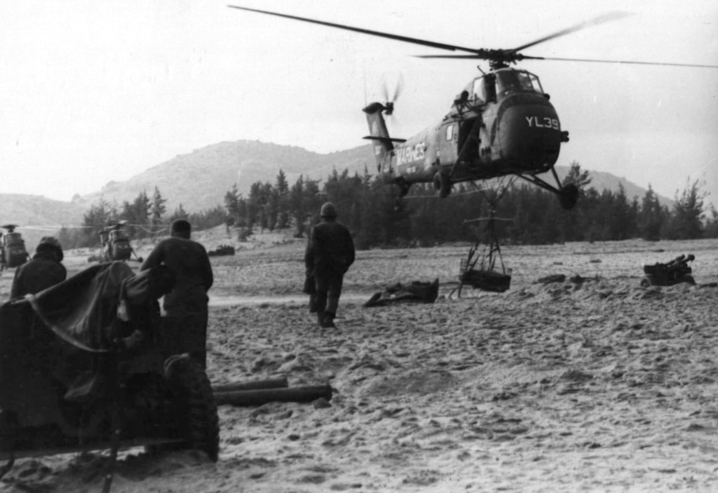 In this image from the United States Marine Corps archives, we see a Sikorsky UH-34 helicopter delivering food and ammunition to troops during combat operations in the Vietnam War. As a military helicopter, the H-34 was nearly obsolete. However the U.S.M.C. and South Vietnamese used the helos extensively throughout the conflict. Additionally, the United States Air Force was known to use them for search and rescue helicopters when searching for downed pilots.