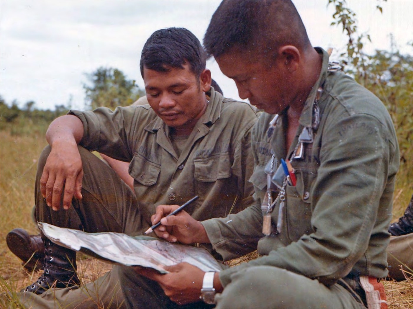 This image shows a Thai lieutenant and one of his soldiers planning a patrol southeast of Saigon. Thailand's involvement in Vietnam was an easy one to understand. They were neighbors to the country and wanted to stop the march of communist totalitarianism through Indochina.