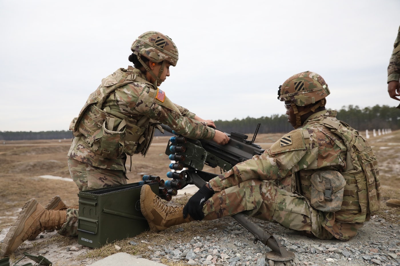 Pvt. Jasmin Camacho and Pvt. Kossi Atsidama, human resource specialists, assigned to 90th Human Resources, Special Troops Battalion, 3rd Division Sustainment Brigade, conduct an MK19 range on Fort Stewart, Georgia, Jan. 21. Soldiers conducted the range as part of 87th Combat Sustainment Support Battalions weapons density to ensure that Soldiers build proficiency with cruiser weapon systems.