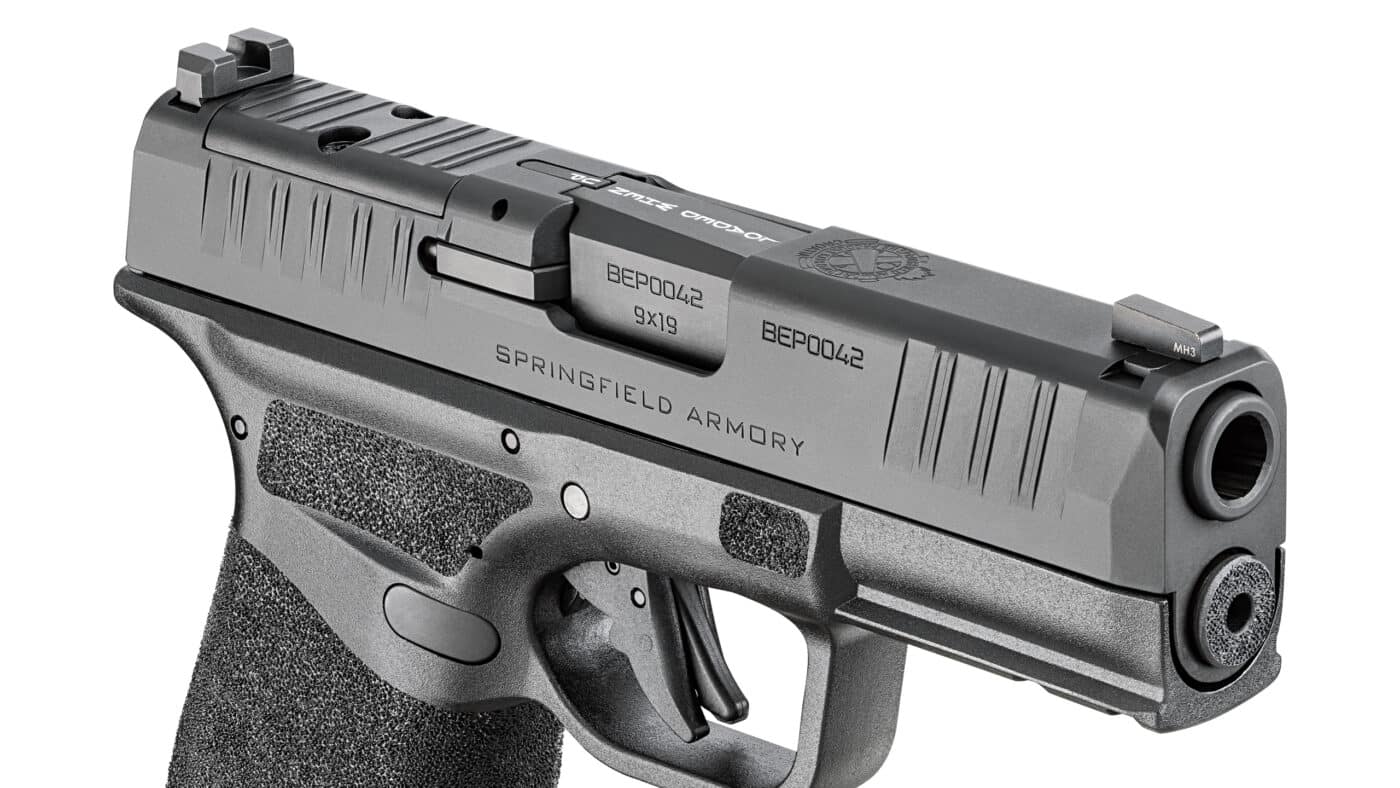 Shown is a new Springfield Armory Hellcat OSP 9mm pistol that is CA compliant. The State of California approved the gun for sale in its jurisdiction to all lawful citizens. The regulations require certain modifications in the manufacture process including the addition of a loaded chamber indicator as shown here. Now the gun is on the roster with the certify designation, it offers a superior alternative to the offerings from Sig Sauer and Glock.