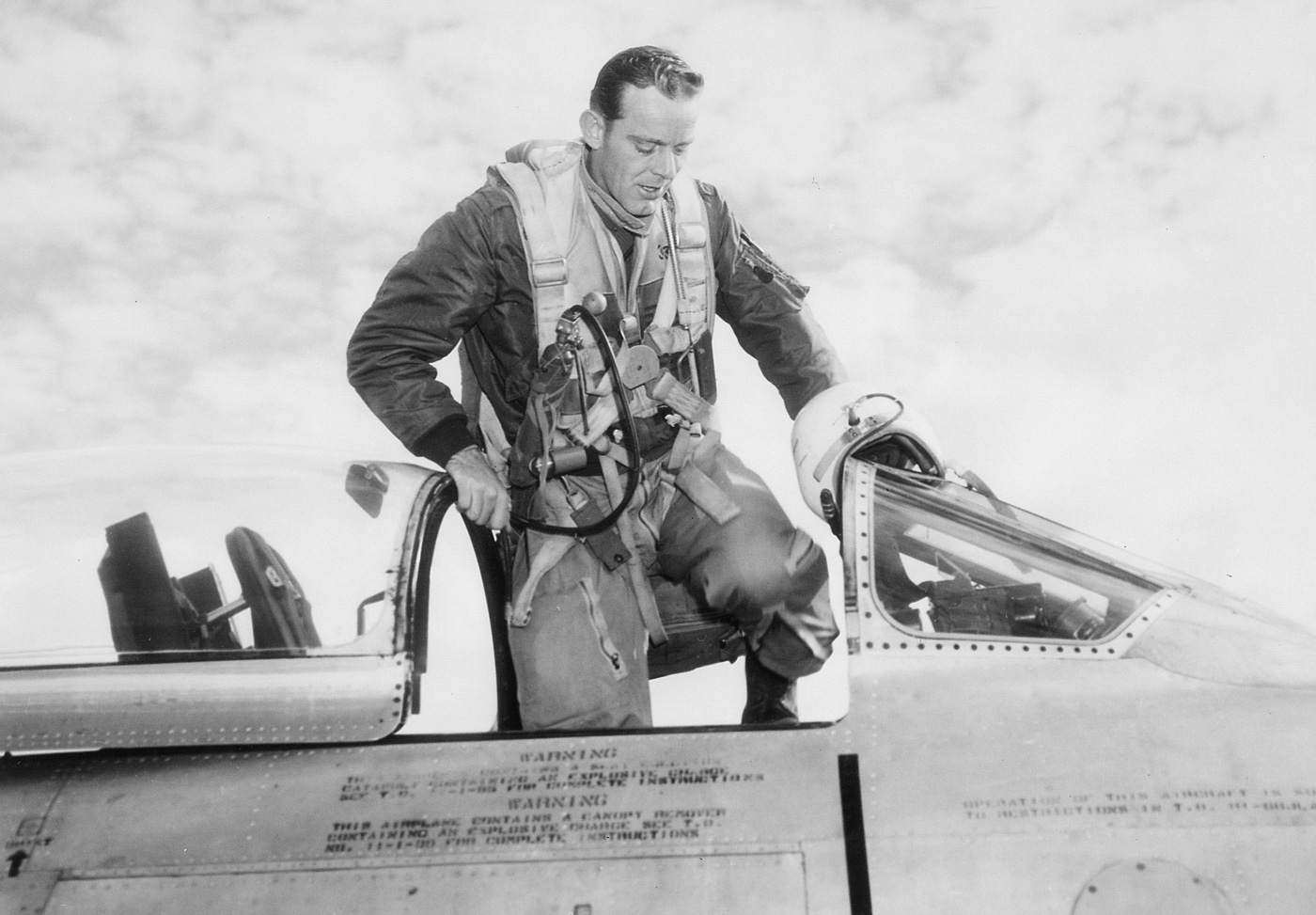 In this photo from the National Archives, Captain Kenneth D. Critchfield, a U.S. Air Force pilot, climbs into his F-86 fighter. The F-86A set a kill ratio to be envied — roughly 12:1. The F-86 line of aircraft were superior to the Russian-built MiG-15 and a pilot could press his advantage over the skies of North Korea. It was the best and most important fighter in the skies of the Korean War. It was under development at the end of World War II which made it ready to go a few short years later. 