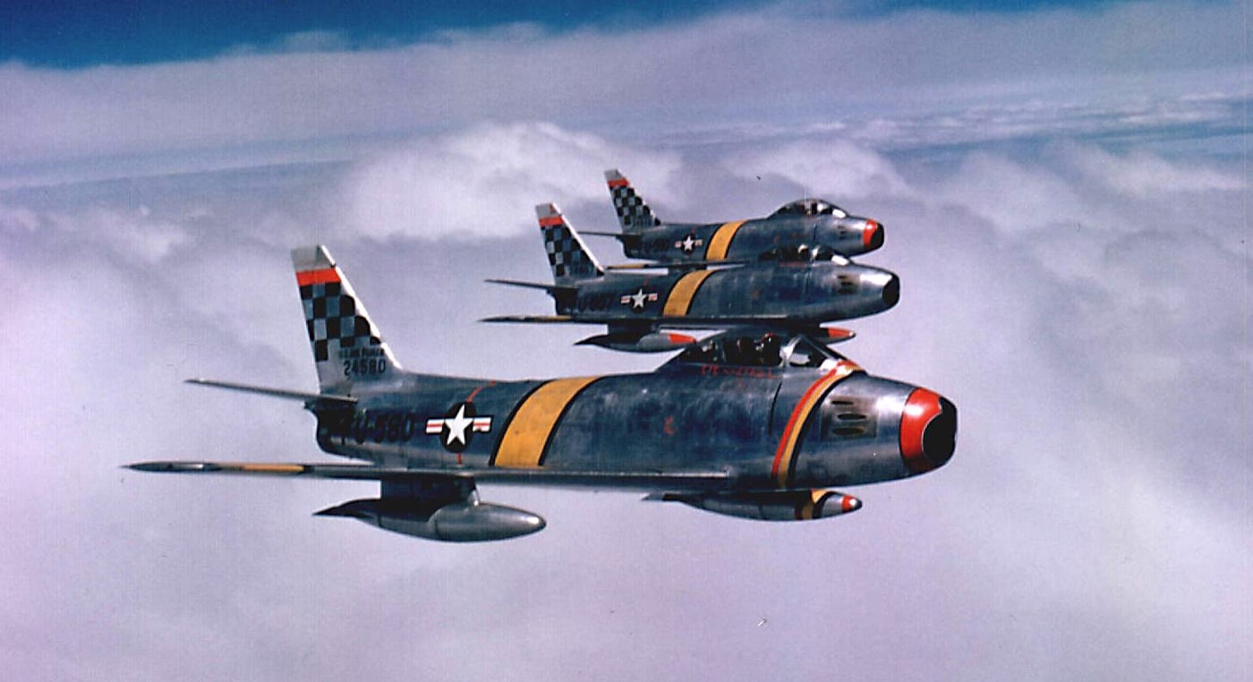 In this photo, a flight of three F-86F Sabres seek out Mikoyan-Gurevich MiG-15 fighter aircraft over North Korea. Many of the MiG-15s were flown by "volunteers" from the Soviet Union. The truth, of course, was that these were front line fighter aircraft pilot on orders from the USSR. These dogfights were tougher for the Americans than those against the Chinese and North Korean communists.