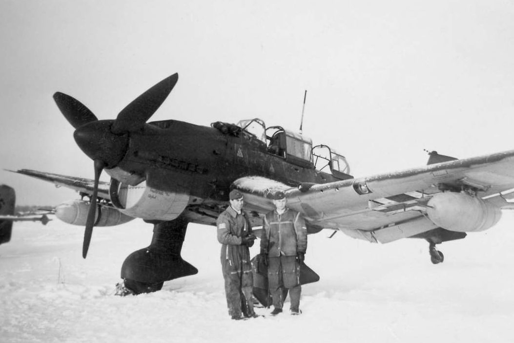In this photograph, we see two German pilots of the Luftwaffe with their Ju 87 dive bomber. Helsinki-Malmi Airport was an airfield in Helsinki, Finland, located in the district of Malmi, 5.4 NM north-north-east of the city centre. It was opened in 1936. Until the opening of Helsinki-Vantaa Airport in 1952, it was the main airport of Helsinki and of Finland.