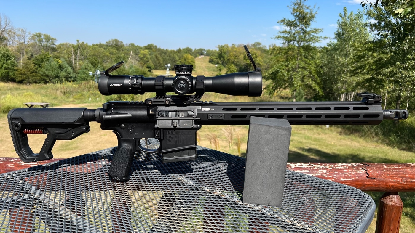 In this photo, we see the author has mounted a a primary arms glx 3-18×44 scope to a Springfield Armory .308 rifle. This precision rifle is a good test bed for the telescopic sight. A telescopic sight, commonly called a scope or riflescope, is an optical sighting device based on a refracting telescope. It is equipped with some form of a referencing pattern, also known as a reticle, mounted in a focally appropriate position in its optical system to provide an accurate point of aim.